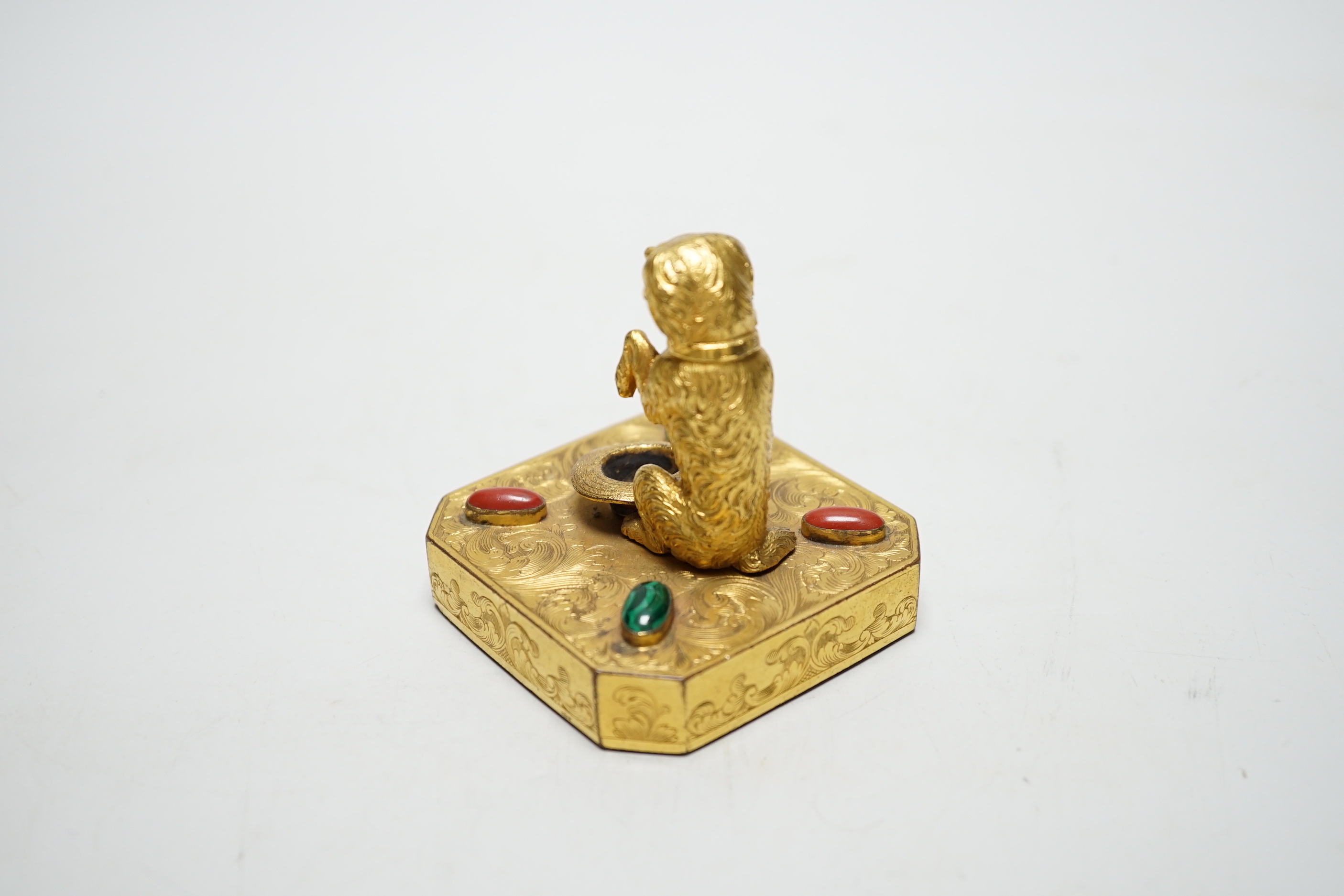 A 19th century Palais Royal ormolu ‘begging dog’ taper holder, 7cm